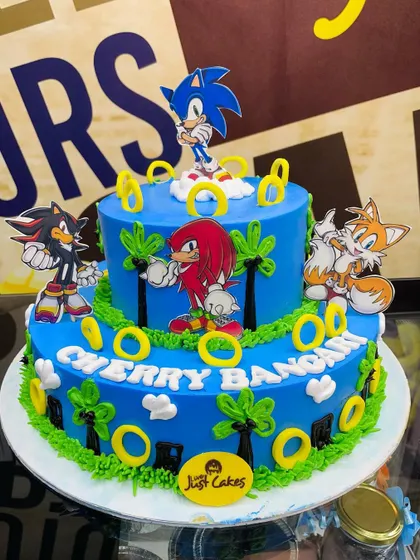 Gotta go fast! A 3kg, two-tiered cake celebrating Sonic the Hedgehog and his friends, complete with palm trees and golden rings.