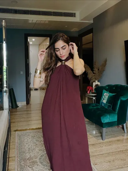 A candid moment, adjusting my hair. This shows the relaxed feel of the outfit, perfect for a family gathering.