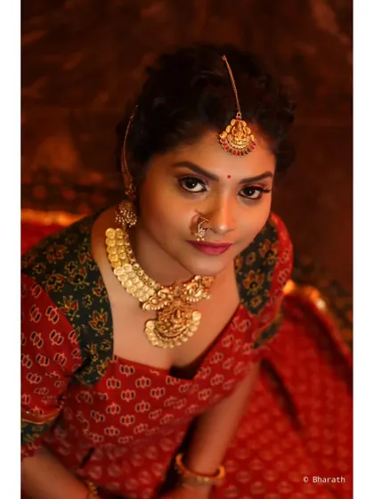 A beautiful high-angle view of a traditional portrait, with the warm lighting creating a classic, painterly feel.