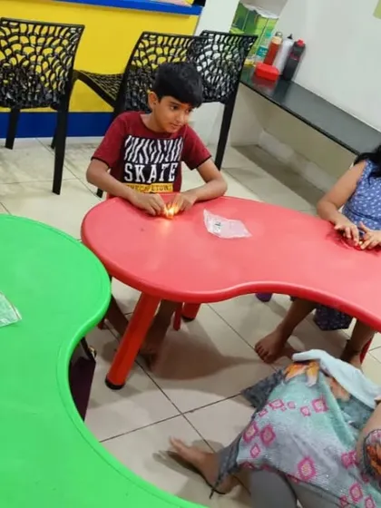 A typical scene from one of my summer camps. Kids are focused on their experiments at their tables, fully absorbed in the process of scientific discovery.