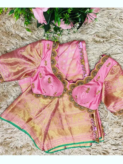 The complete pink Kanjeevaram saree and custom scalloped blouse set, ready for a bride.
