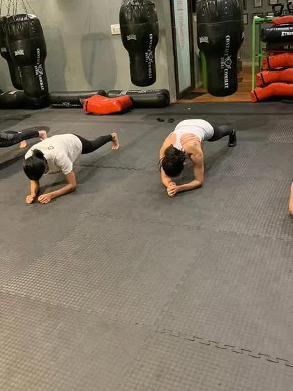 The plank is a simple but brutal test of core stability and mental toughness. Holding this position builds the endurance needed to stay strong and maintain posture during a physical struggle.