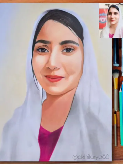 A serene portrait of a woman in a white headscarf, drawn on A4 paper. The colored pencils create a soft and respectful image.