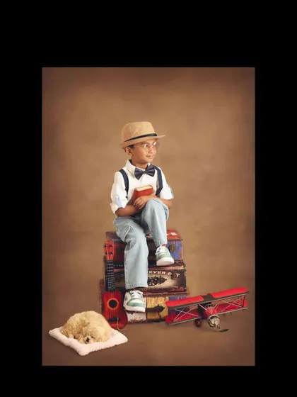 A pensive moment for our little traveler, perhaps reading a map for his next destination. This theme is wonderful for imaginative play.