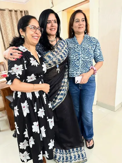 Posing with my cousins. You can see how the indigo print on the saree adds a touch of colour to the classic black.