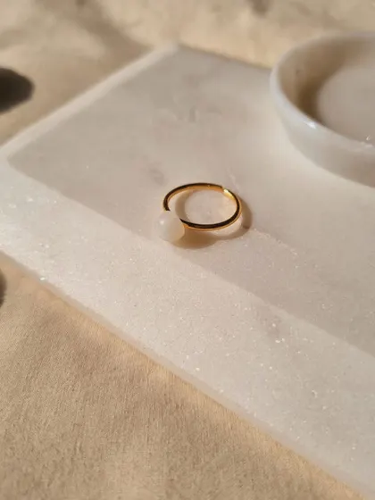 Another shot of the White Moonstone Mood Ring, a simple and elegant piece for anyone who feels out of luck.