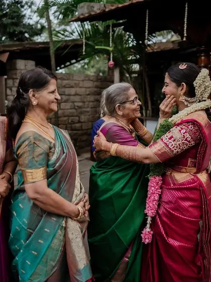 An emotional embrace between the bride and her family. These are the heartfelt, tear-jerking moments that we feel privileged to witness and preserve forever.