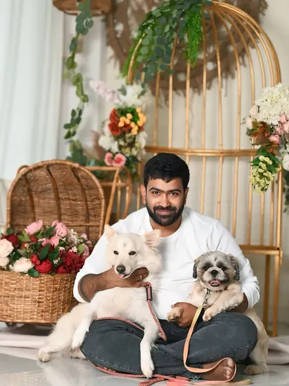 The dad-to-be gets his own portrait with the furry members of the family. Everyone is waiting for the new arrival.