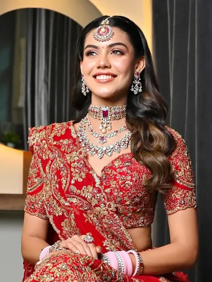 The bride's joyful smile perfectly complements her soft and romantic hairstyle. This open hair look is a great choice for brides who want to feel comfortable and glamorous.