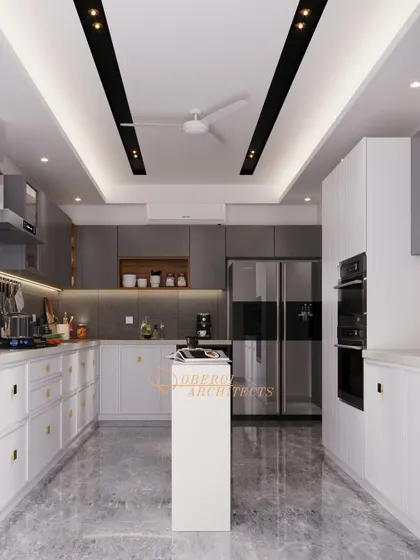 Another view of the parallel kitchen, showing the integrated appliances and the effective use of track lighting on the ceiling.