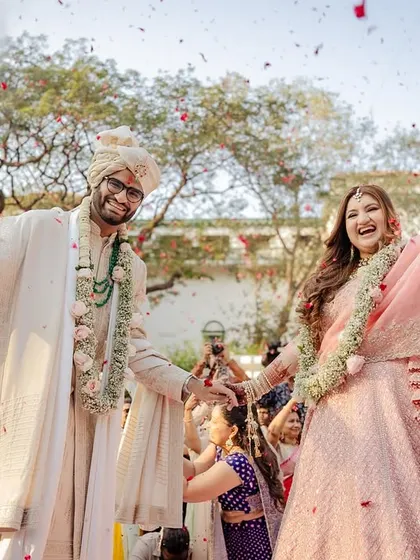 That just-married feeling! Capturing the explosion of joy, cheers, and a shower of petals during the varmala is one of my favorite parts of the day.