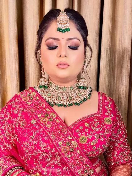 A close-up on the eye makeup. The soft smokey effect with a hint of shimmer adds depth and dimension, making the eyes pop.