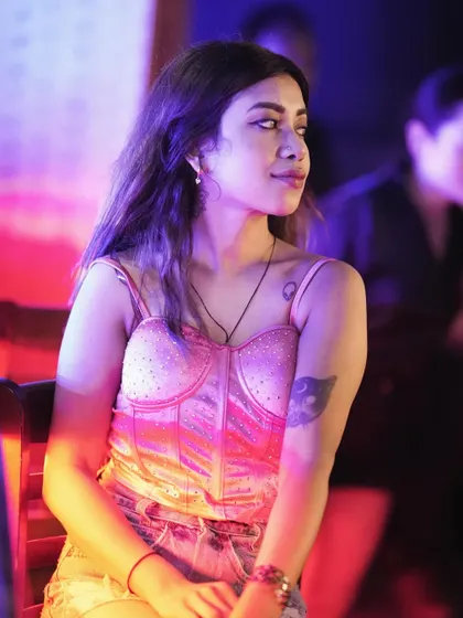 A candid moment captured during my time in Doha. The lighting in the club was amazing, creating a really cool mood.