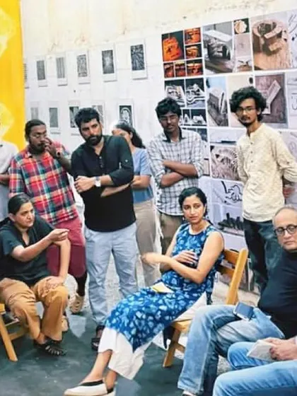 A review session where students present their work. My role as a mentor is to listen, question, and guide them in developing their architectural voice and understanding of urban complexities.