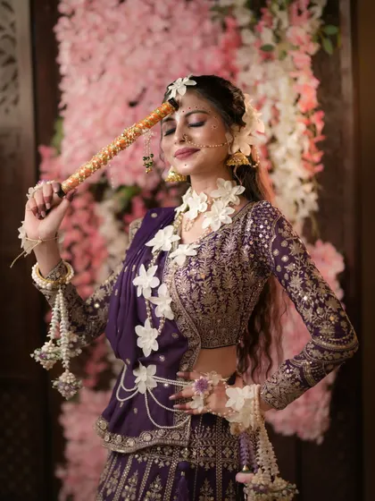 A playful and divine shot of Radha with the flute.