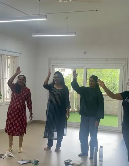 Waving hello is the action we use for the 'h' sound. This interactive, movement-based approach is a core part of my phonics workshops, making learning active and engaging.