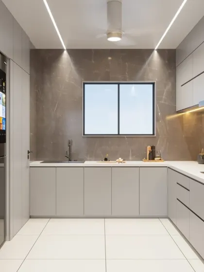 This modern kitchen features minimalist grey cabinets and a matching backsplash, creating a clean, monolithic look. A smart refrigerator is seamlessly integrated into the cabinetry, blending technology with design.