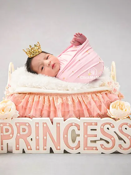 I believe every baby is royalty, and this 'Princess' themed shoot is all about celebrating your little one's grand arrival. We can create a fairytale moment just like this, complete with a tiny crown and a custom setup.