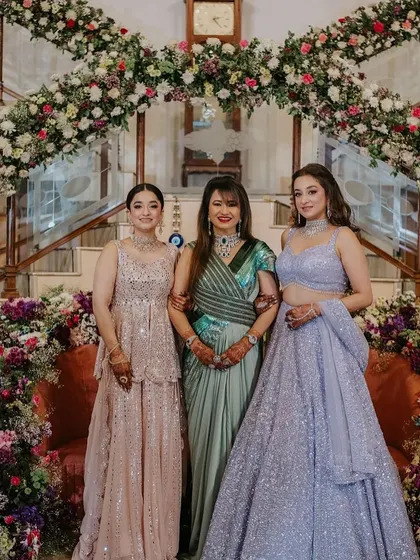 A family portrait where the bride's beautiful wavy hairstyle is on display.