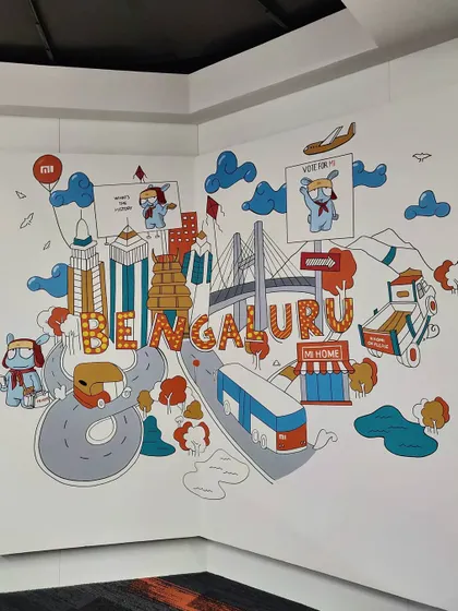 The completed corner mural for Xiaomi, featuring their mascot exploring our city. This is how we turn a corporate space into something fun and unique.