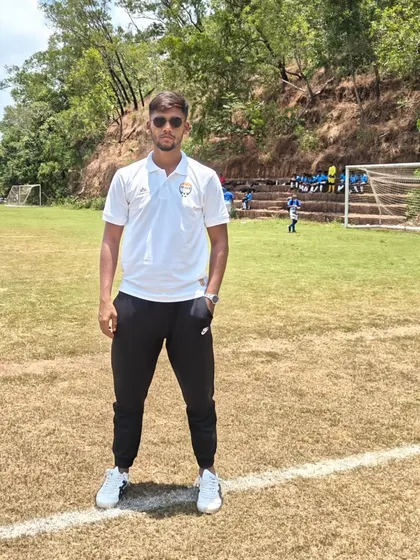 A coach standing on the line at the Goa Football Festival. Representing our academy at national events is a proud moment for all of us.