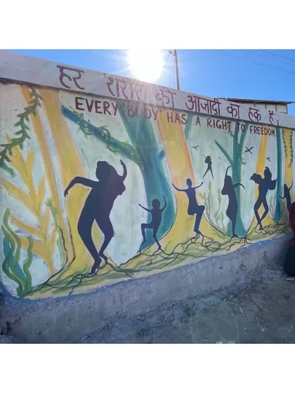 This mural in Raga, Arunachal Pradesh, is a celebration of bodily freedom. The silhouettes dance with joy and abandon, a visual reminder that every body has a right to freedom.