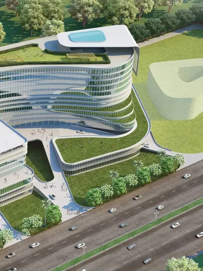 This aerial rendering illustrates our vision for biophilic architecture. The building's form is integrated with the landscape, with green roofs and curved structures that purify the air and reduce energy consumption.