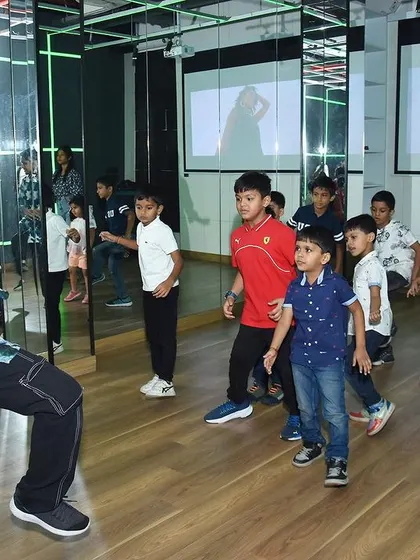 Moments from a high-energy dance party and workshop for kids. These events are full of fun, learning basic choreography, and enjoying dance in a group.