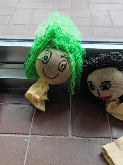 Look at these fun characters. The puppets made by the children in Bangladesh have so much personality, from their yarn hair to their hand-drawn faces.