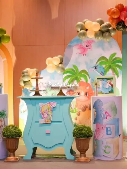 Another angle of Avyaan's full dino-themed stage, showing the balance of colors and props that create a cohesive and visually appealing setup.
