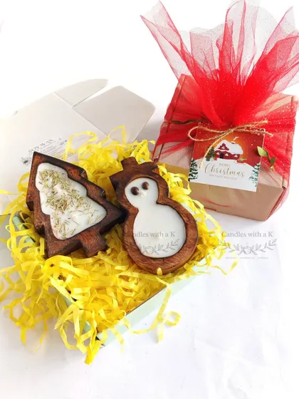 My exclusive Christmas collection gift box, featuring a wooden Christmas tree candle and a snowman wax sachet.