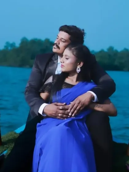 This shot captures the serene, romantic mood of a boat ride, with the couple looking picture-perfect in our rental outfits.