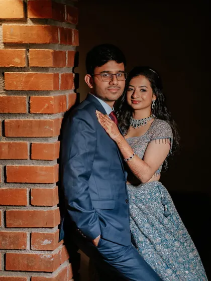 A classic couple's portrait. Her makeup is timeless and elegant, designed to look beautiful in photographs that will be cherished for a lifetime.