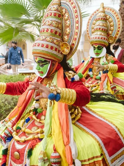Kathakali performers in their vibrant costumes, adding an element of traditional storytelling and artistry to the celebration.