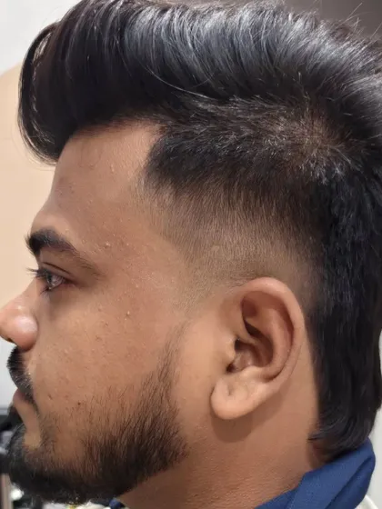 A stylish mohawk fade for a modern and edgy look.