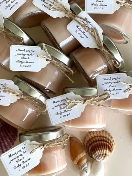 These peach-colored mini candles were for Liam's baby shower. The personalized tags and jute string give them a lovely, rustic feel.