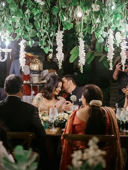 The smiles say it all. This was an intimate dinner party for Neha and Tushar in a Coorg forest, where we managed everything from setting up a satellite kitchen to ensuring the seven-course meal was served perfectly. It's these moments of pure joy that make all the meticulous planning worthwhile.