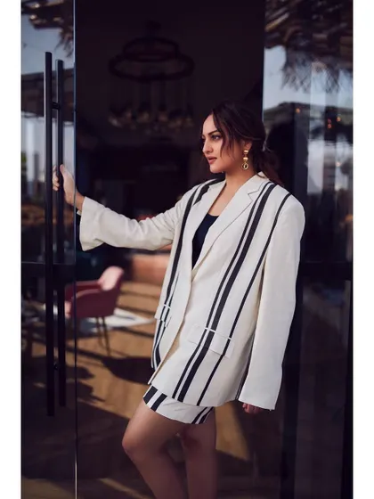 A more relaxed but equally chic suit look for Sonakshi Sinha. This oversized striped blazer and shorts set from Appapop is perfect for a stylish daytime event.