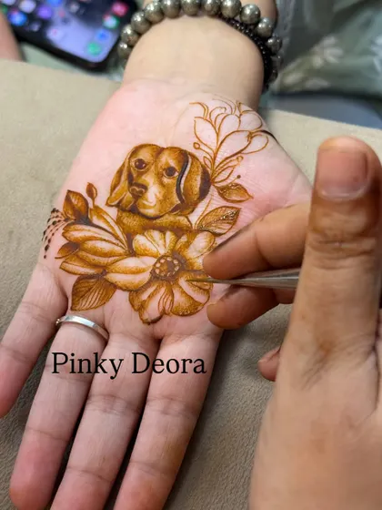 A portrait of a sweet dog nestled among flowers, created with fine lines and shading. This design is for Team Dog, celebrating their loyalty and love.