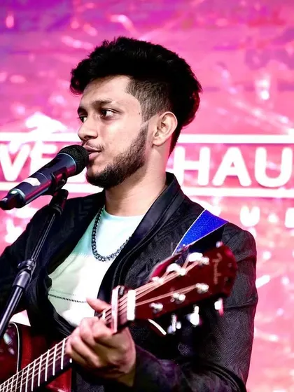 Another moment from our Revel Haus gig. Whether I'm singing or playing the guitar, I'm always connected to the music and the musicians sharing the stage with me.