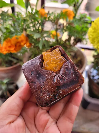 This is a detailed look at one of my two-toned coffee facial soaps. It provides gentle exfoliation while cleansing the skin.