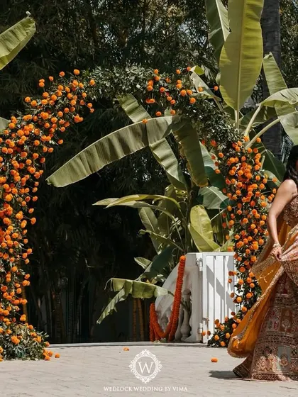 This Haldi ceremony was a burst of color and unforgettable moments. We used vibrant tissue flowers, playful origami birds, and colorful smoke bombs to bring the venue to life.