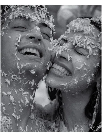 Pure, unadulterated joy. This candid black and white shot from Amala and Aditya's haldi ceremony is what we live for, capturing the real emotions and happy chaos that make a wedding memorable.