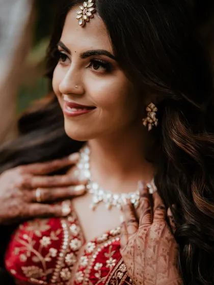 A beautiful close-up portrait of the bride, Sushmitha, on her reception day.