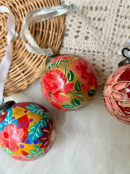Feeling the Christmas spirit with our hand-painted bauble ornaments.