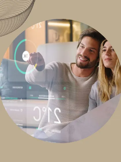 A couple enjoys the benefits of a fully automated home, with controls seamlessly integrated into the environment.