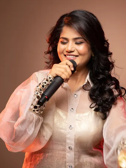 The singer in her element, with makeup that enhances her expression without being distracting.
