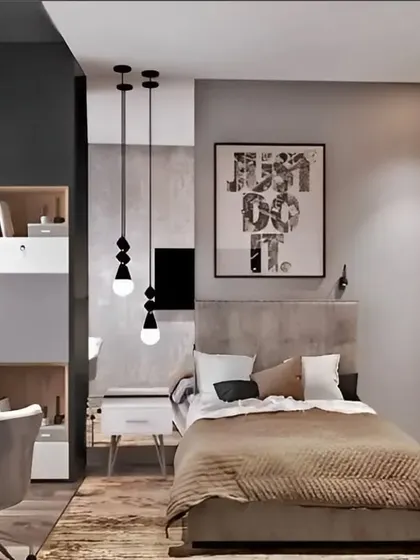 A contemporary bedroom with a mix of textures and materials. The design includes a built-in desk, open shelving, and unique pendant lights, creating a stylish and personalized room.