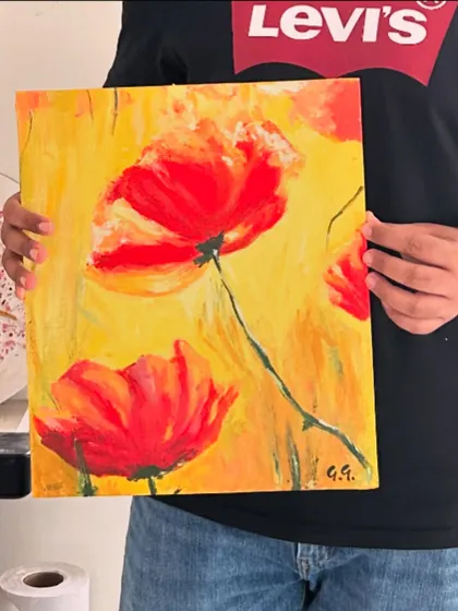 A vibrant floral canvas painting created by a guest. Our membership classes allow you to explore different techniques over several sessions.