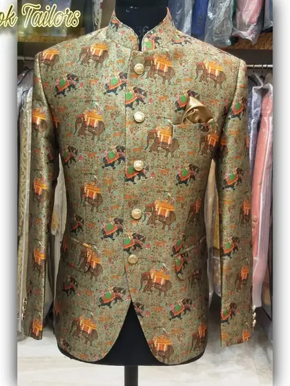 A unique printed Jodhpuri jacket featuring a traditional elephant motif. This is a perfect piece for someone who wants to wear something truly Indian and artistic.